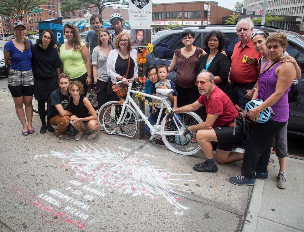 Asif's mother, Lizzi Rahman (fourth from left) stands with a group of activists and families on Sunday's ride<br/>